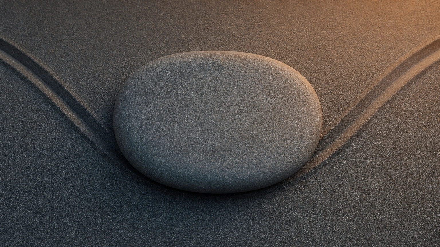 Illustration : sable sombre, pierre plate, deux sillons divergents.